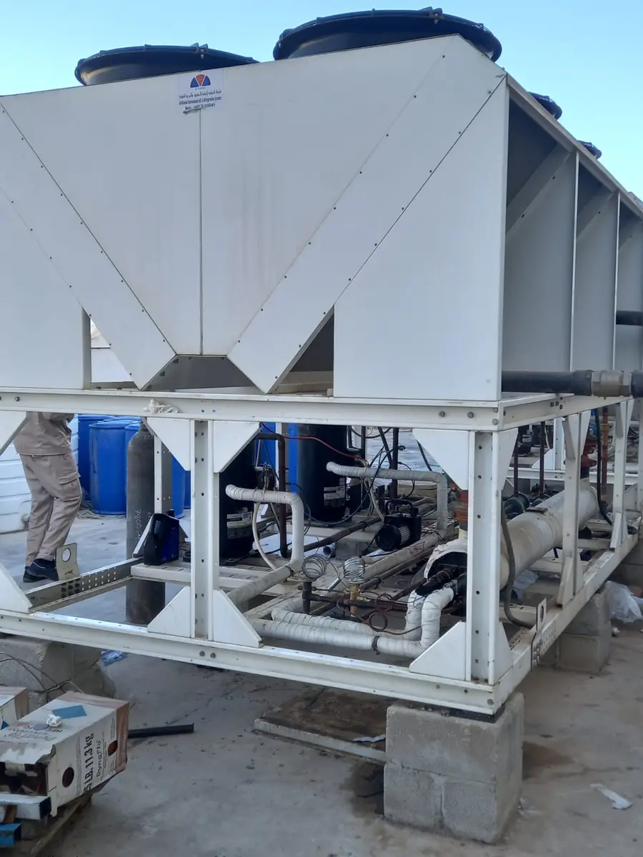 Air-cooled chiller with chilled water pump set and piping underneath
