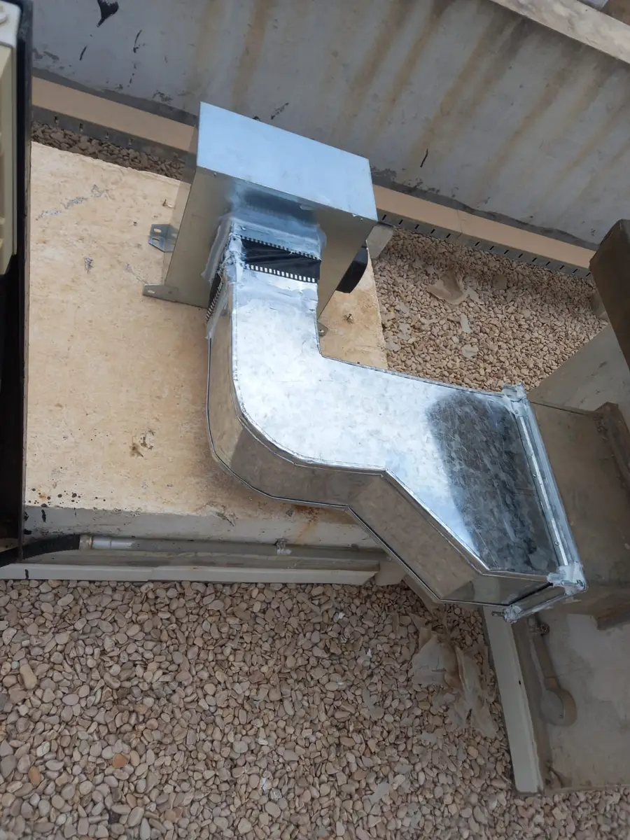 Galvanized steel duct section installed on a rooftop