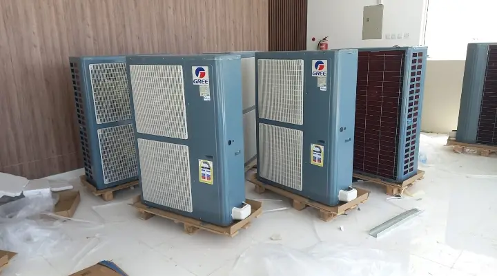 New outdoor AC units on pallets ready for installation