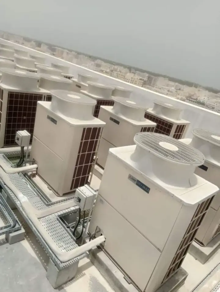 VRF outdoor units with insulated piping on cable trays